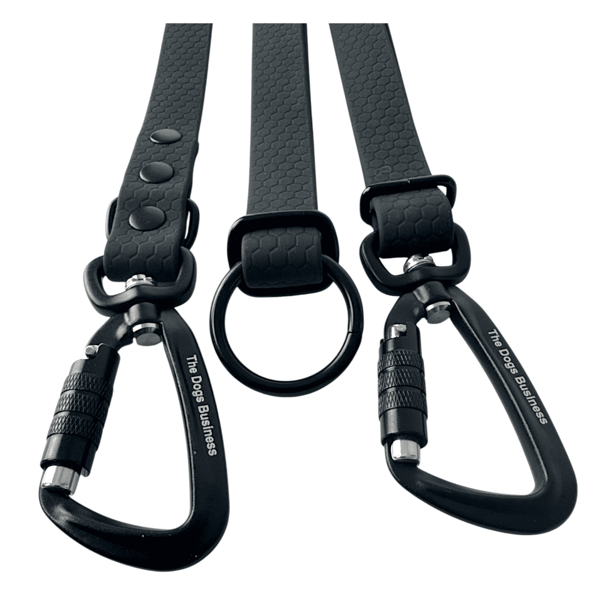 Three black WAVE Hands-Free Leads with textured patterns are shown. Each features a metal carabiner clip engraved with "The Dogs Business" and various metal rings and clasp designs at the ends.