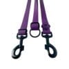Two purple WAVE Hands-Free Leads with black metal clips and a central black ring, displayed on a white background. Each lead has a textured pattern and three black rivets by the ring.