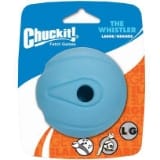 Packaging for the Chuckit! The Whistler Ball Dog Toy showcases a large, blue, spherical toy. The background is blue and orange with illustrations and product details.