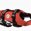 The EzyDog Dog Flotation Device - Life Jackets for Dogs, in red and black, features adjustable straps, a top handle, and a round side logo, providing safety for pets during water activities.