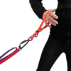 Freedom Handle used as a short lead for close control, walking two dogs tangle-free with twist-lock carabiner.