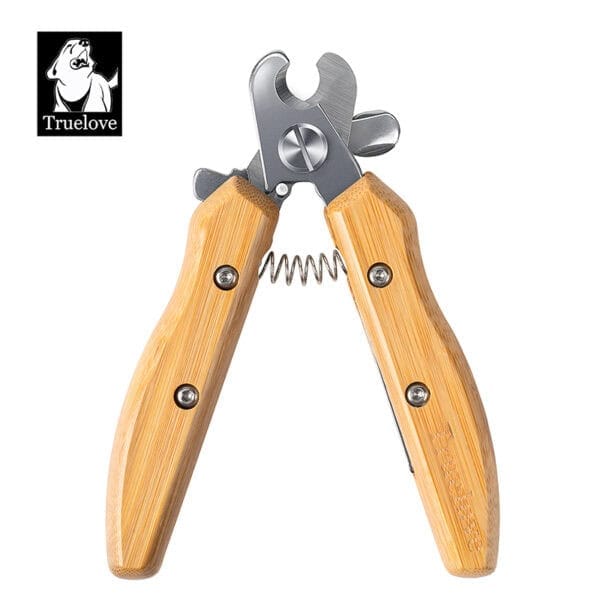 The Bamboo Pet Nail Clipper with Safety Guard – Dog & Cat Grooming features wooden handles, stainless steel blades, a spring mechanism, locking latch, and a top-left "Truelove" logo with a dog.