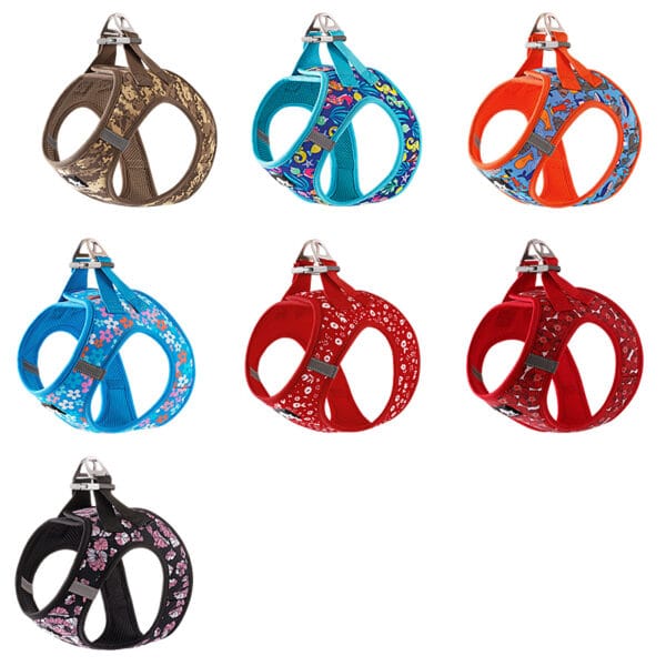 Seven Truelove Easy Fit Quick-Release Pet Harnesses with Dual D-Rings, shown in vibrant patterns and colors—brown, blue, red, orange, and black—are arranged in two rows on a white background.