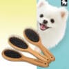 Three Truelove Bamboo Pet Grooming Combs with black bristles are shown in front of a happy white dog. The background is divided yellow and light blue, with the Truelove logo featured in the top right corner.