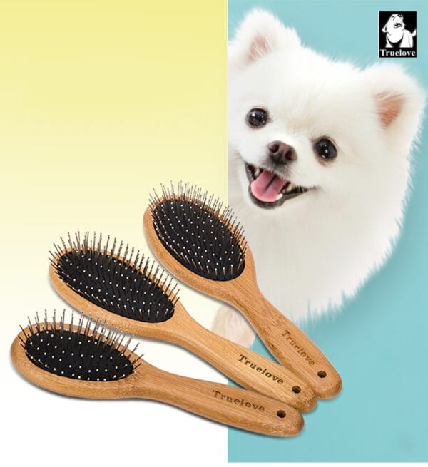 Three Truelove Bamboo Pet Grooming Combs with black bristles are shown in front of a happy white dog. The background is divided yellow and light blue, with the Truelove logo featured in the top right corner.
