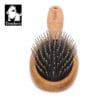 The Truelove Bamboo Pet Grooming Comb – Premium Brush features a wooden handle, metal bristles with rounded tips, and is shown on a white background. The "Truelove" logo with a dog's head appears in the top left corner.