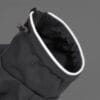 Close-up of the reflective collar on the gray dog raincoat, highlighting the visibility and safety features in dark or rainy conditions.