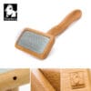 The Truelove Bamboo Pet Comb is a grooming tool with fine metal bristles, an angled handle, detailed bamboo wood, and an engraved "Truelove" logo featuring a dog’s face.