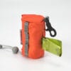 An orange pouch with black clip and gray details dispenses green waste bags. It’s the perfect accessory for the Truelove TLB2012 Waterproof Multi-Use Pet Carrier, making pet waste cleanup easy and tidy wherever you go.