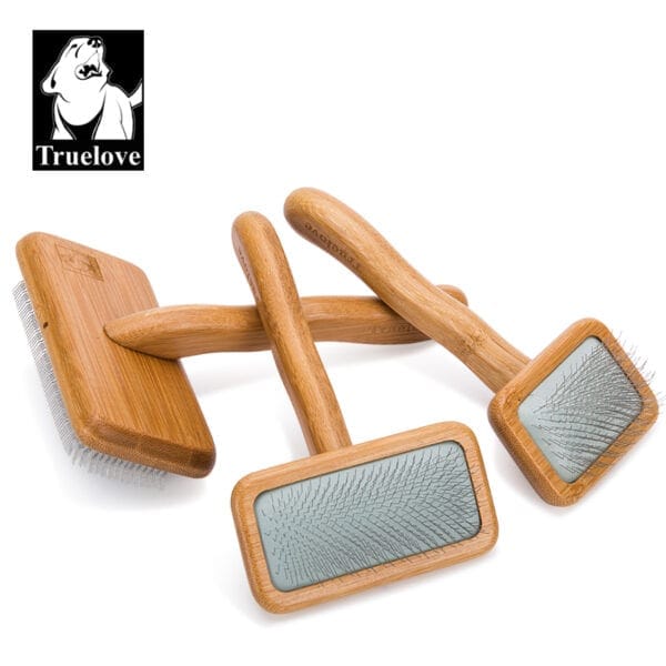 Three Truelove Bamboo Pet Comb - Grooming Tools with wooden handles and fine metal bristles are arranged on a white background, with the Truelove logo featuring a dog’s head in the top left corner.