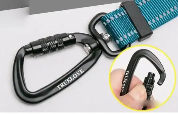 Close-up of the Truelove Adjustable Dog Leash - Reflective Nylon & Padded Handle TLL2671, showing a black "TRUELOVE" carabiner on a blue and grey strap. Inset shows fingers twisting the lock for secure fastening.