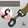 Close-up of a black stainless steel snap hook on an olive green Truelove Durable Bungee Dog Leash - Shock Absorbing TLL2281. Inset shows hook being opened. Text: "Stainless Steel Snap Hook," "Pull Resistant," with arm icon.