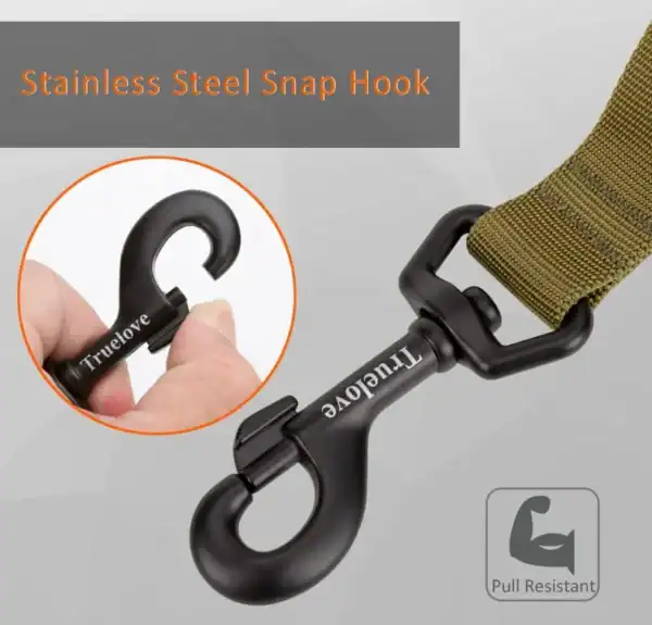 Close-up of a black stainless steel snap hook on an olive green Truelove Durable Bungee Dog Leash - Shock Absorbing TLL2281. Inset shows hook being opened. Text: "Stainless Steel Snap Hook," "Pull Resistant," with arm icon.