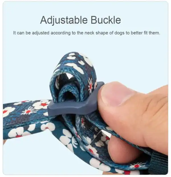 A hand adjusts the Truelove Floral Camouflage Dog Collar TLC5273, featuring a blue floral pattern and a gray adjustable plastic buckle for a customized fit to your dog's neck shape. "Adjustable Buckle" is shown above.