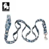 The Truelove Functional Dog Leash with Neoprene Handle TLL3112 features a blue base with white and pink florals, metal clasps on both ends, and a black "Truelove" logo with a dog’s head in the corner.