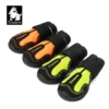 Four Truelove Outback Boots - Reflective & Traction for Pets TLS4861, two orange and two yellow with black soles and reflective straps, are lined up on a white background. The Truelove logo with a dog's face is in the upper left corner.