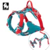 The Truelove Reflective Camouflage Dog Harness TLH5653 features red straps, teal/white/red patterned air mesh, adjustable aluminum buckles, a metal leash ring, and padded chest. Inset shows harness laid flat; Truelove logo appears in the corner.