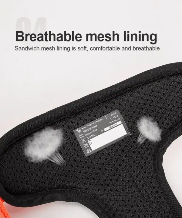 Close-up of the Truelove Reflective Chest Harness TLH5991's black mesh fabric and label, showing breathability with white puffs. Text: "Sandwich mesh lining is soft, comfortable, and breathable.