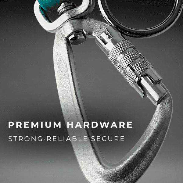 Close-up of a silver carabiner clip with a locking mechanism, set against a grey background. Perfect for Premium Waterproof Dog Gear UK. Text on the image reads: "Premium Hardware. Strong. Reliable. Secure.