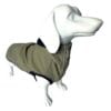 A white dog mannequin wears the TDB light Jacket, a light brown waterproof fleece-lined dog jacket with black trim and buttons, displayed against a plain white background.