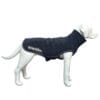 A white dog mannequin wears a dark blue dog coat with white trim and "The Dogs Business" logo on the side, displayed against a plain white background.