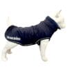 A white dog mannequin wears the TDB Element Jacket, a navy blue coat with a collar and white trim. "The Dogs Business" logo appears on the side. The background is plain white.