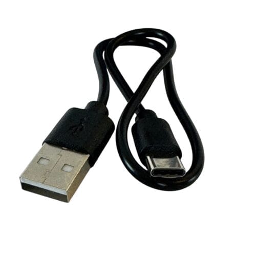 A black The Dogs Business Safety Light USB-A to USB-C cable, with both connectors visible, is loosely coiled on a white background.