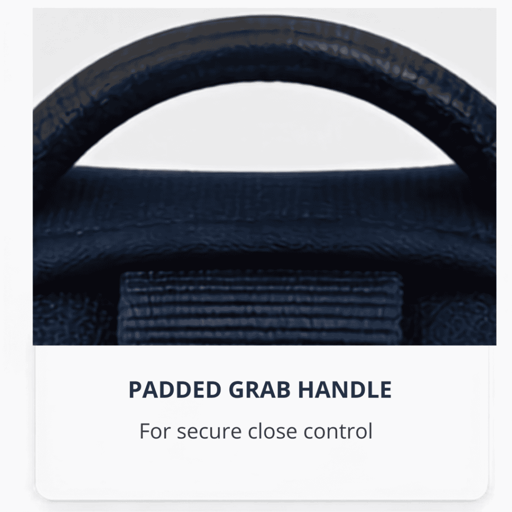 Close-up of a black padded grab handle on a bag, with text below reading “PADDED GRAB HANDLE. For secure close control.”.