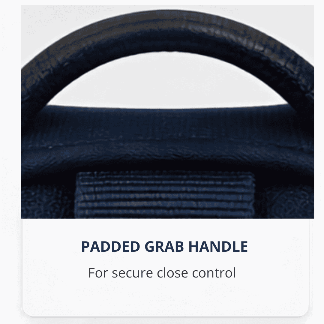 Close-up of a black padded grab handle on a bag, with text below reading “PADDED GRAB HANDLE. For secure close control.”.