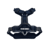 OBRIY Anatomical Harness in navy blue features adjustable straps, a padded handle, buckle fastenings, a front metal ring, and a patch reading “THE DOG’S BUSINESS.” The harness is shown against a white background.