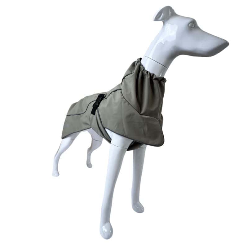 A grey Coastal Jacket Light dog jacket with a high collar and side buckle fastening, displayed on a white dog mannequin.